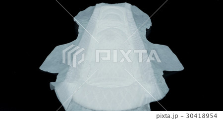 Sanitary napkin white color on black background. 30418954