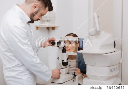 Professional experienced doctor using diagnostic Professional experienced doctor using diagnostic 30420651