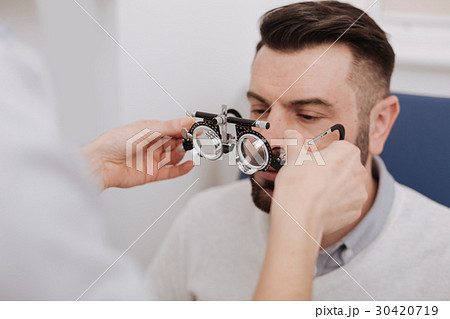 Professional experienced ophthalmologist helping Professional experienced ophthalmologist helping 30420719