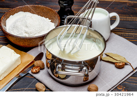 bechamel sauce in a pan and ingredients bechamel sauce in a pan and ingredients 30421964