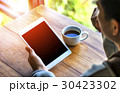 Man with computer, notebook, headset 30423302