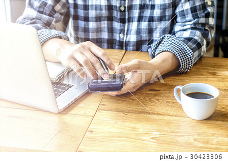 Man with computer, notebook, headse Man with computer, notebook, headse 30423306