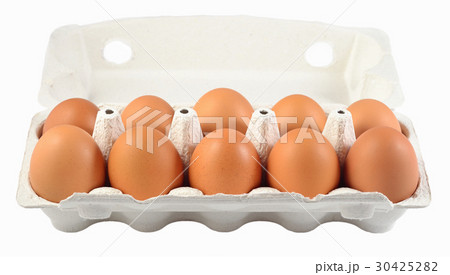 Carton of fresh brown eggs on a white Carton of fresh brown eggs on a white 30425282