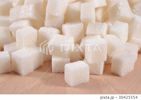 Heap of refined sugar 30425554