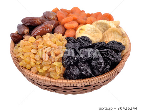 Various dried fruits in wicker bowl 30426244