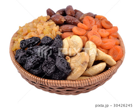 Various dried fruits in wicker bowl Various dried fruits in wicker bowl 30426245
