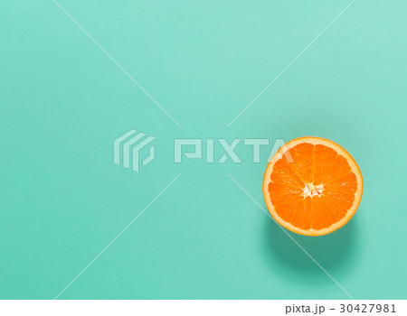 Halved fresh orange Halved fresh orange 30427981