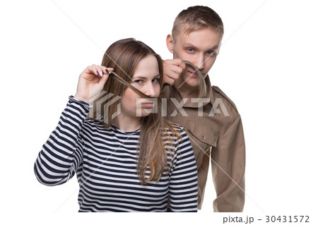 Fooling around woman and man in soldier's uniform 30431572