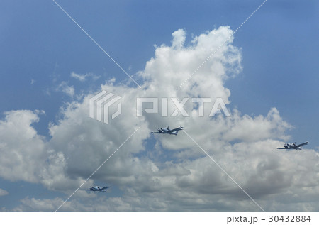 Planes fly against the background of clouds Planes fly against the background of clouds 30432884
