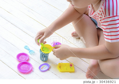 Asian boy playing toy on white wooden.Top view 30436921