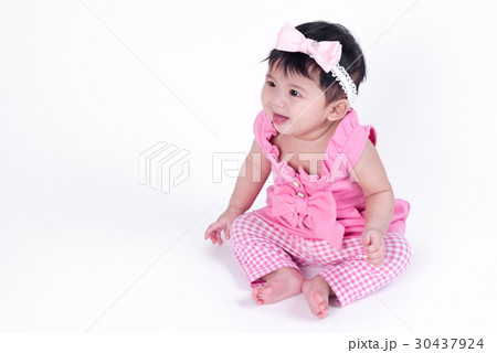 Asian baby girl is smiling and laughing  30437924