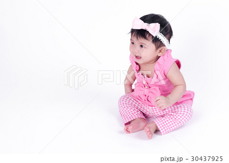 Asian baby girl is smiling and laughing  30437925