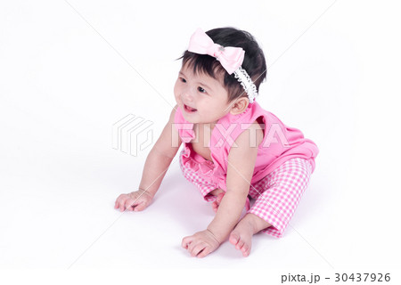 Asian baby girl is smiling and laughing  30437926