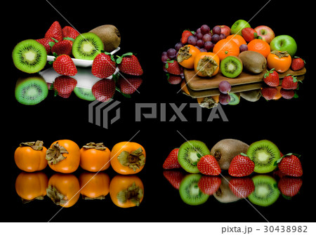 Ripe juicy fruit on a black background. 30438982