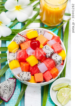 Bowl of fresh exotic fruit salad Healthy breakfast 30441282