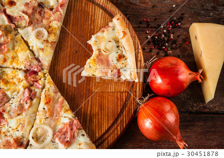 Pizza cut on slices, top view. Junk food, calories Pizza cut on slices, top view. Junk food, calories 30451878