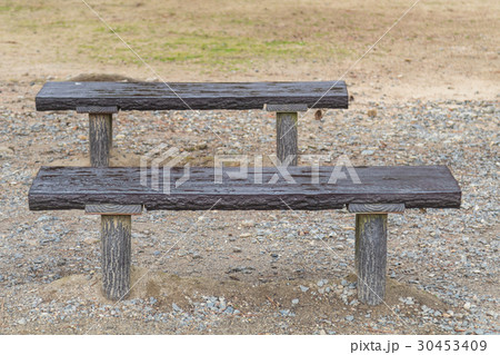 wet empty bench in the park wet empty bench in the park 30453409