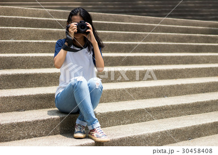 asian girl take photo in city asian girl take photo in city 30458408