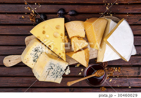 Cheese board. Various types of cheese. Top view Cheese board. Various types of cheese. Top view 30460029