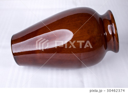 Beautiful brown ceramic glazed vase. Beautiful brown ceramic glazed vase. 30462374