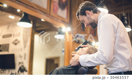 Young Man in Barber Shop Hair Care Service Concept 30463557