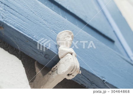 closeup of hinge on ancient wooden shutters 30464868