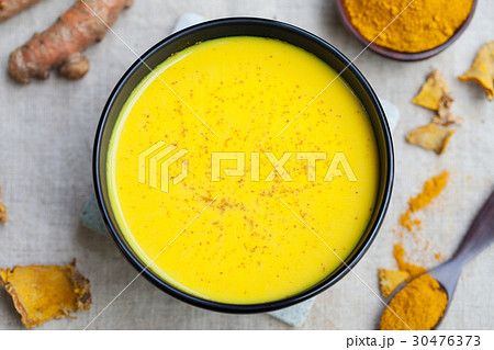 Turmeric drink, latte, tea, milk. Top view. 30476373