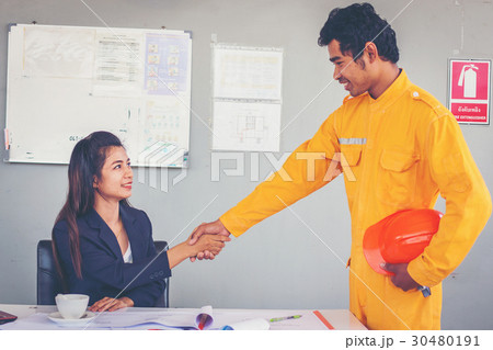 engineer discussing Construction project 30480191