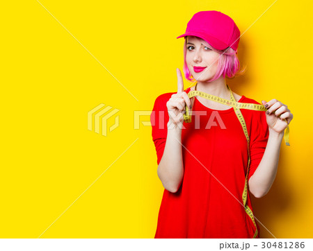 young woman with centimeter 30481286