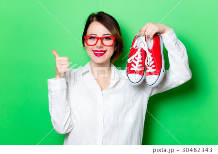 young woman with gumshoes young woman with gumshoes 30482343