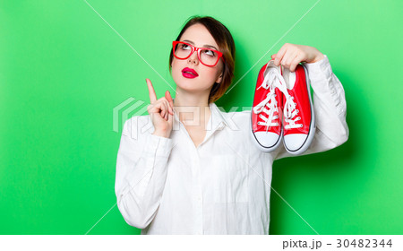 young woman with gumshoes young woman with gumshoes 30482344