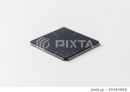 semiconductor IC chip isolated on grey background semiconductor IC chip isolated on grey background 30484668