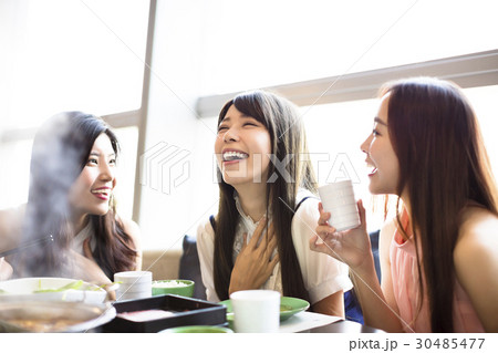 happy young Women group Eating hot pot happy young Women group Eating hot pot 30485477