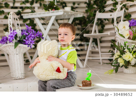 Happy little kid boy celebrating his birthday 30489652