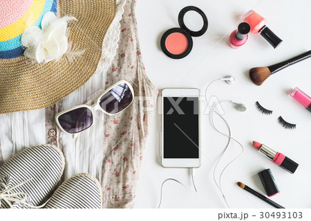 Woman stuff, makeup, cellphone and accessories 30493103