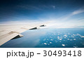 cloud blue sky and plane wing view through 30493418