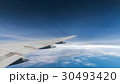 cloud blue sky and plane wing view through 30493420