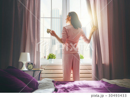 woman enjoying sunny morning woman enjoying sunny morning 30493433