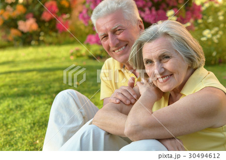 Old  couple on a summer walk 30494612