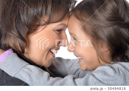 Little daughter with her mother Little daughter with her mother 30494818