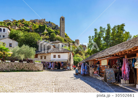 Shops and ancient architecture in 30502661