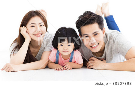 family with little girl playing on the floor family with little girl playing on the floor 30507398