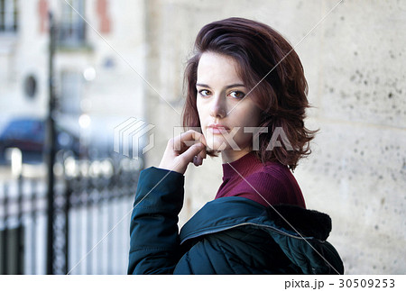 Beautiful young girl with dark hair Beautiful young girl with dark hair 30509253