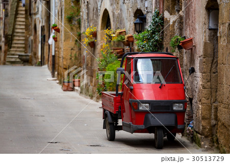 Piaggio Ape at the empty street 30513729