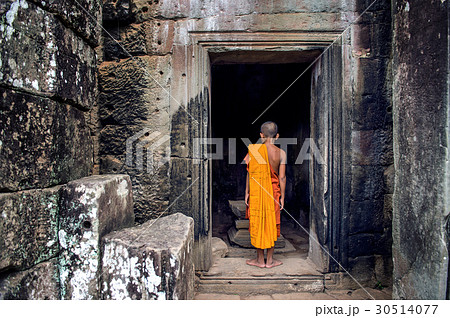 The monks in the ancient stone faces. The monks in the ancient stone faces. 30514077
