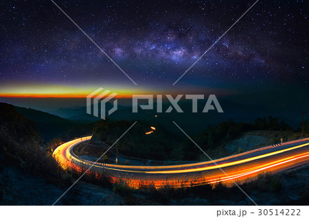 Milky way and car light on road at Doi Inthanon. 30514222