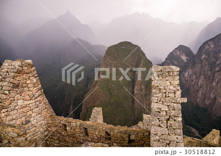 Dark rain clouds at Machu Picchu Inca city, Peru 30518812