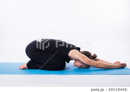 Beautiful sporty fit yogini woman practices yoga Beautiful sporty fit yogini woman practices yoga 30519449