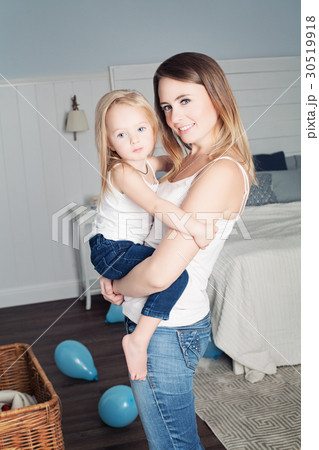 Mom Hugs her Daughter. Smiling Mother and Daughter Mom Hugs her Daughter. Smiling Mother and Daughter 30519918