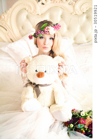 Beautiful Woman with Flower Arrangement Beautiful Woman with Flower Arrangement 30519921